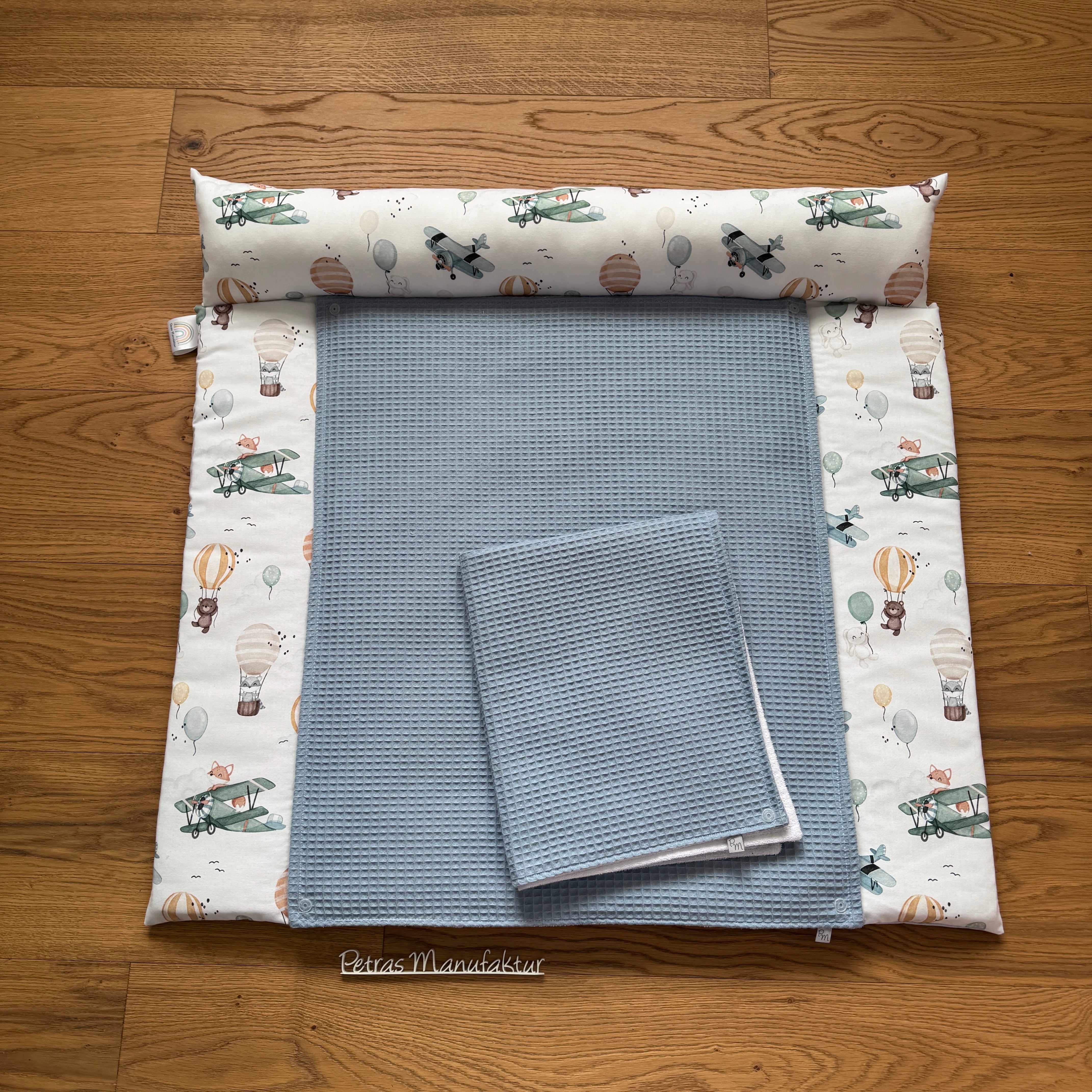 Wickelauflage "fliegende Kuscheltiere“