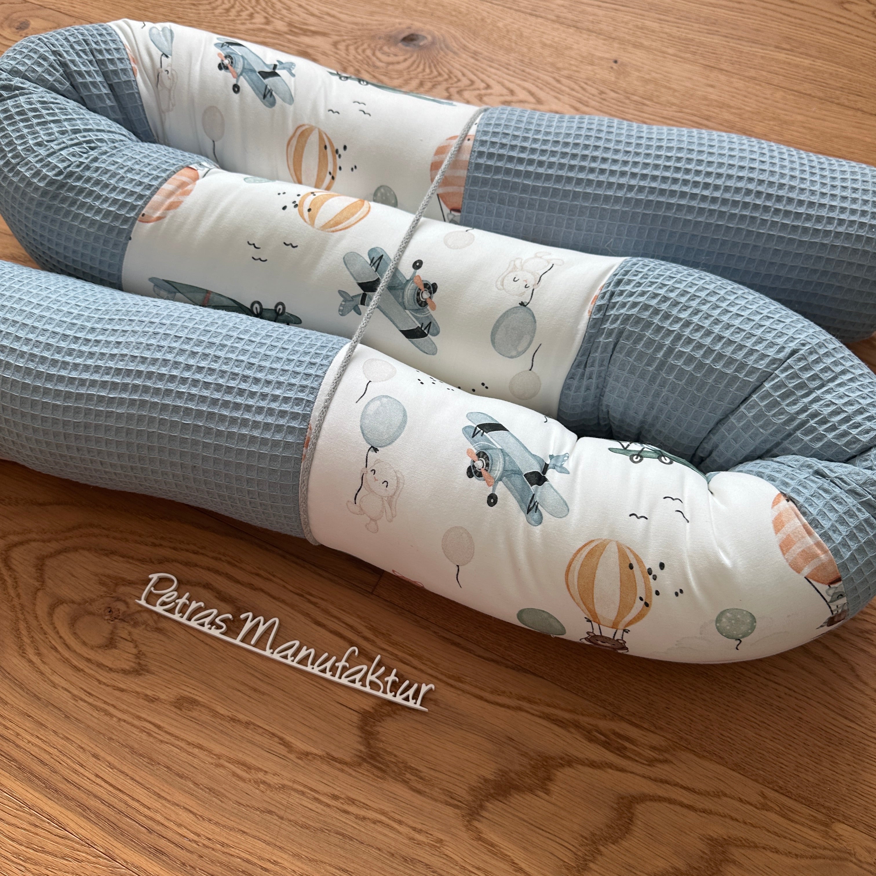 Bettschlange "fliegende Kuscheltiere"